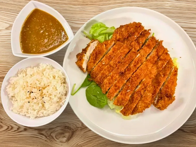 Crispy pork cutlet with curry sauce and steamed rice at Sake Mian, a Japanese Restaurant in Ardmore
